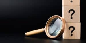magnifying-glass-business-questions-news