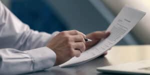 person-reads-important-document-news