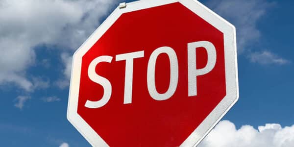 stop-sign-red-blue-sky-news