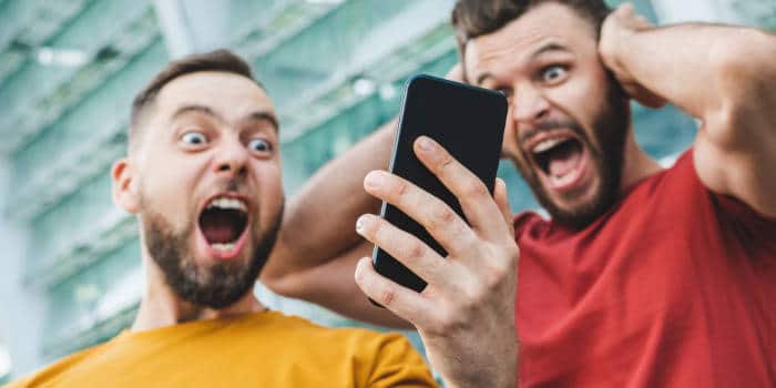 two-lads-cheering-at-lottery-winnings